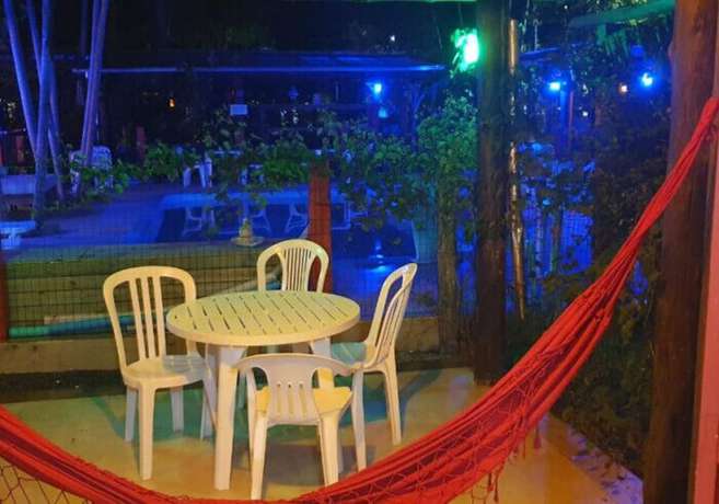 Imagen de la habitación del Hotel Ferrugem Eco Village. Foto 10