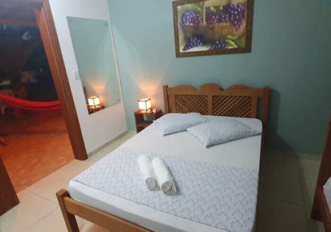 Imagen de la habitación del Hotel Ferrugem Eco Village. Foto 11