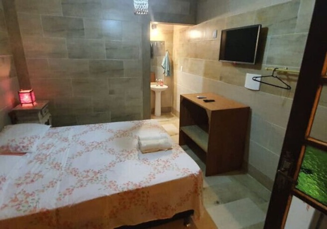 Imagen de la habitación del Hotel Ferrugem Eco Village. Foto 14