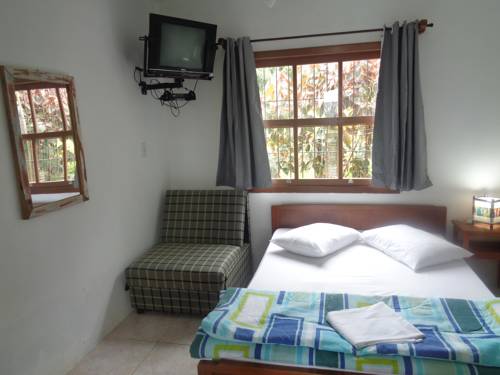 Imagen de la habitación del Hotel Ferrugem Pousada Região. Foto 5