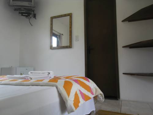 Imagen de la habitación del Hotel Ferrugem Pousada Região. Foto 6