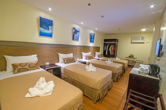 Imagen de la habitación del Hotel Fersal Puerto Princesa. Foto 10