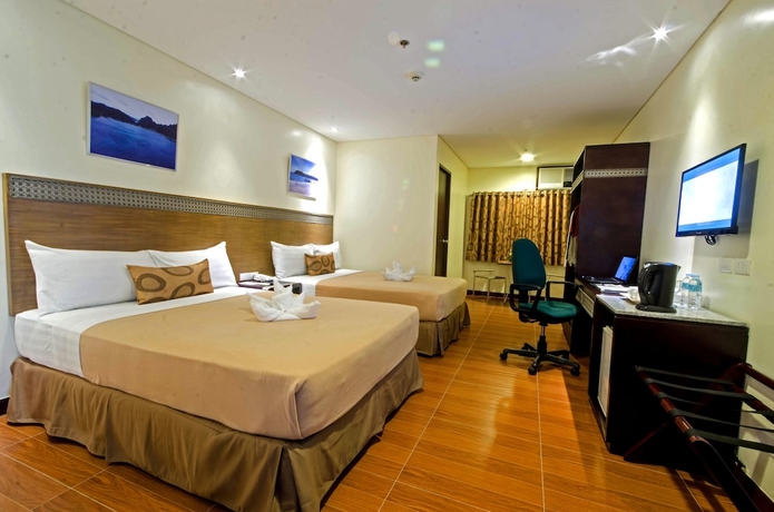 Imagen de la habitación del Hotel Fersal Puerto Princesa. Foto 12