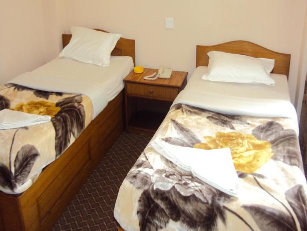 Imagen de la habitación del Hotel Festoon. Foto 2