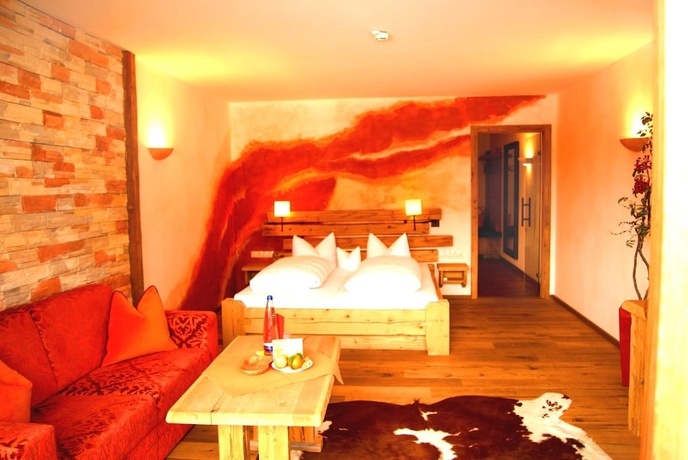 Imagen de la habitación del Hotel Feuriger Tatzlwurm. Foto 9