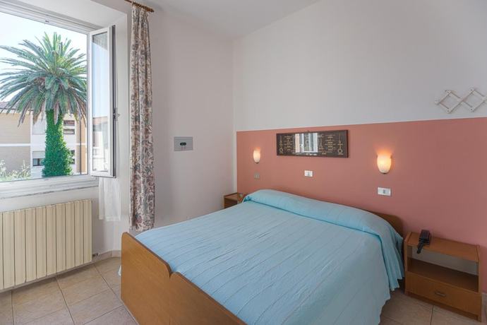Imagen de la habitación del Hotel Fiammetta, Livorno. Foto 16