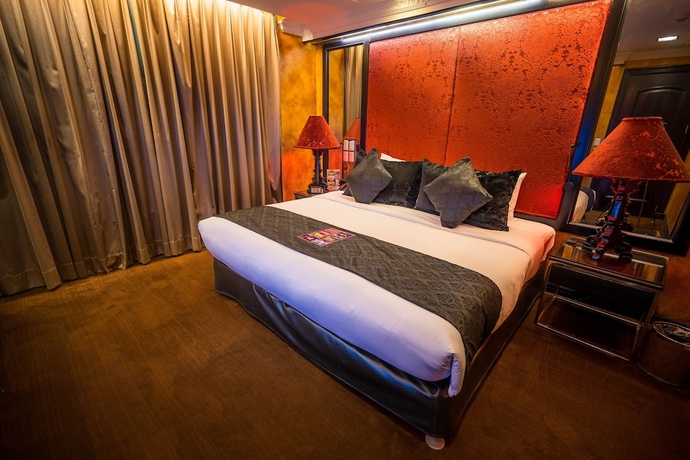 Imagen de la habitación del Hotel Fields Plaza Condo. Foto 2