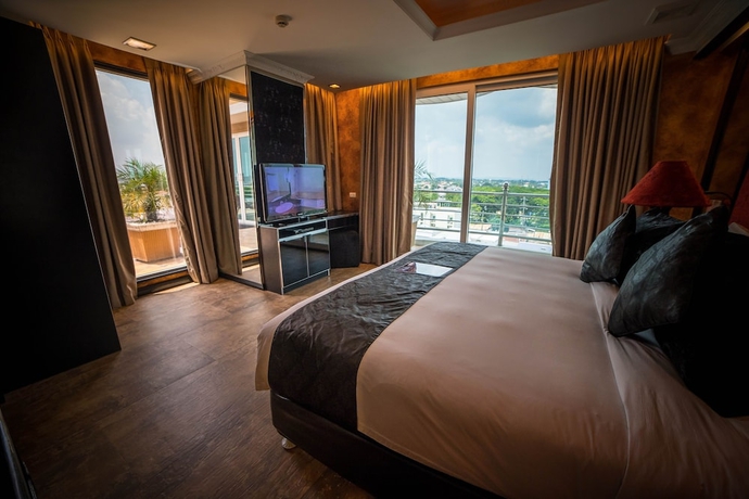 Imagen de la habitación del Hotel Fields Plaza Condo. Foto 7