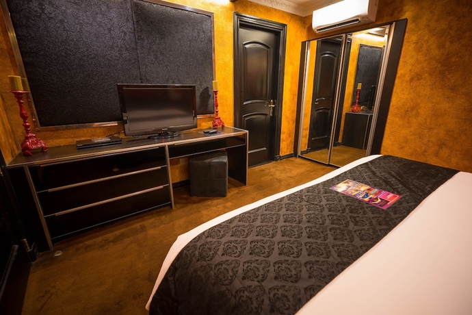 Imagen de la habitación del Hotel Fields Plaza Condo. Foto 10