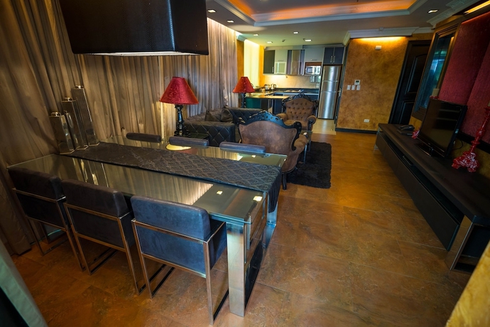 Imagen de la habitación del Hotel Fields Plaza Condo. Foto 12