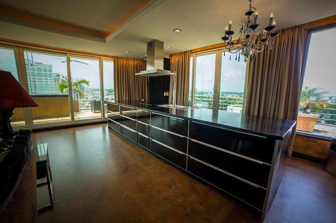 Imagen de la habitación del Hotel Fields Plaza Condo. Foto 13