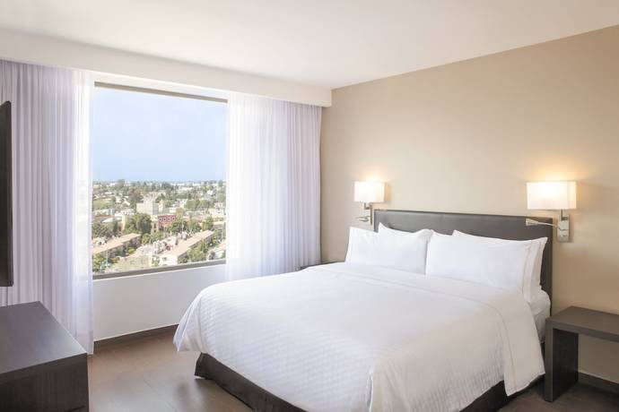 Imagen de la habitación del Hotel Fiesta Inn Express Puebla Explanada. Foto 3