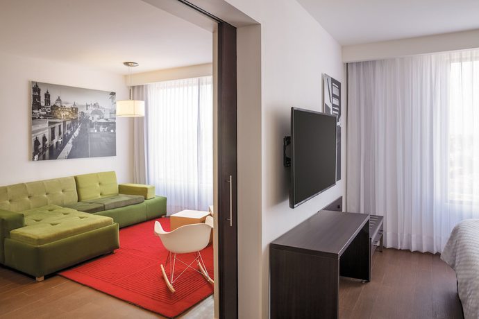 Imagen de la habitación del Hotel Fiesta Inn Express Puebla Explanada. Foto 4