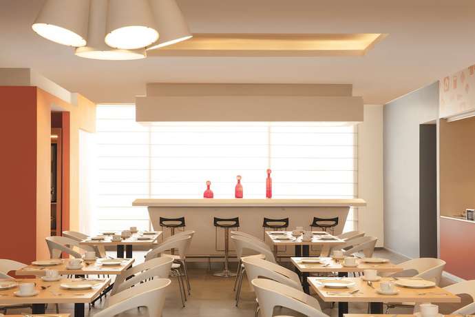 Imagen de la habitación del Hotel Fiesta Inn Express Puebla Explanada. Foto 7