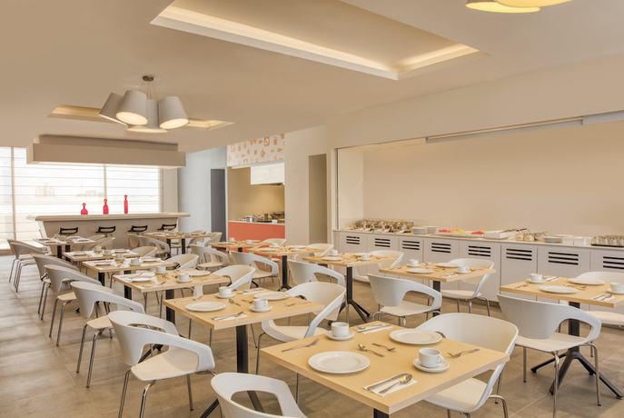 Imagen de la habitación del Hotel Fiesta Inn Express Puebla Explanada. Foto 9