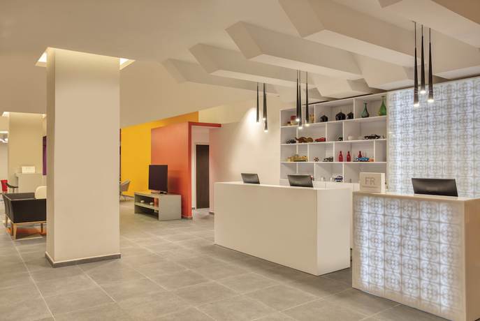 Imagen de los interiores del Hotel Fiesta Inn Express Puebla Explanada. Foto 18