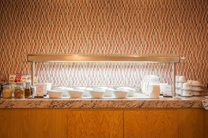 Imagen del bar/restaurante del Hotel Fiesta Inn Pachuca Gran Patio. Foto 3