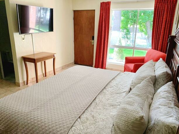 Imagen de la habitación del Hotel Fiesta Mexicana. Foto 12