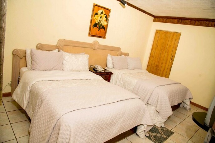 Imagen de la habitación del Hotel Fiesta Mexicana. Foto 15