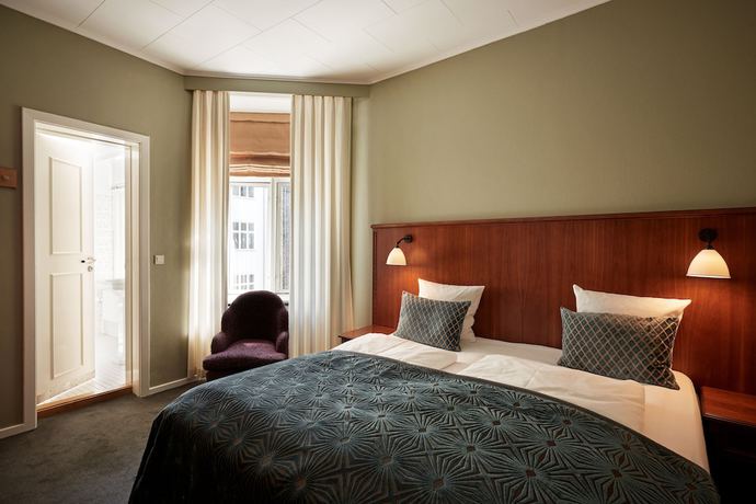 Imagen de la habitación del Hotel Fiftyseven House Copenhagen. Foto 3