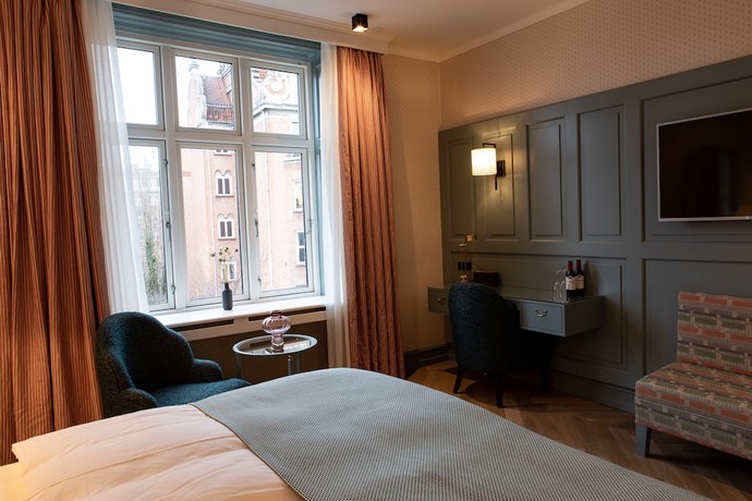 Imagen de la habitación del Hotel Fiftyseven House Copenhagen. Foto 7
