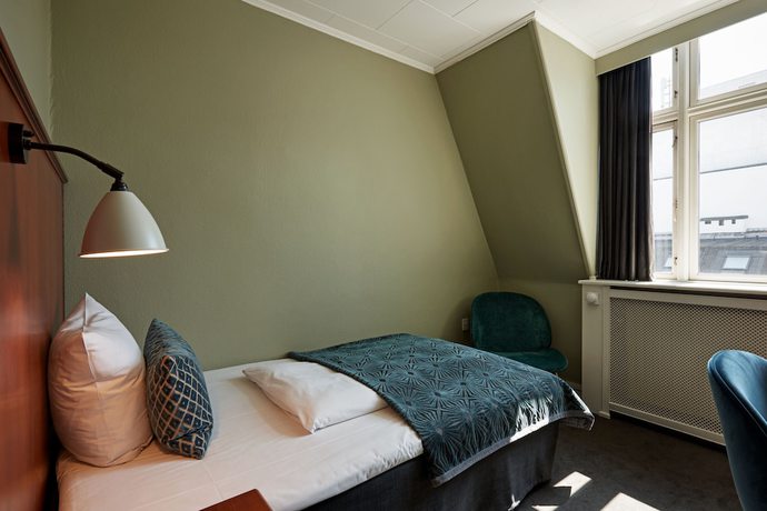 Imagen de la habitación del Hotel Fiftyseven House Copenhagen. Foto 8