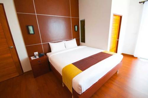 Imagen de la habitación del Hotel Fig Boutique. Foto 9