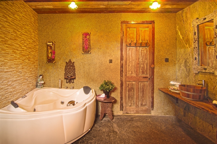 Imagen de la habitación del Hotel Fig Tree Hill Resort. Foto 3