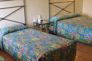 Imagen de la habitación del Hotel Figtree Lodge. Foto 4