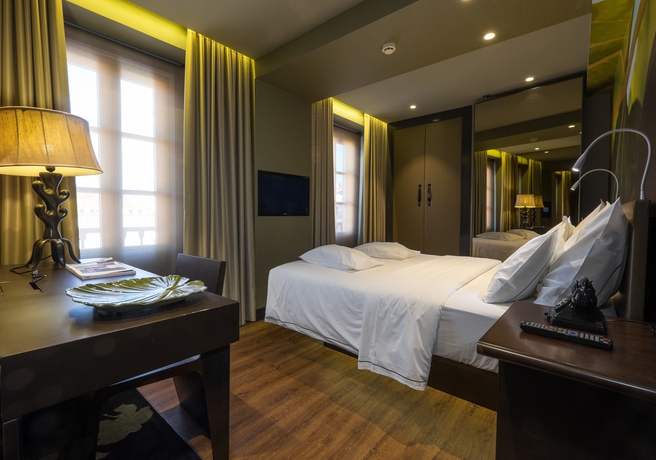 Imagen de la habitación del Hotel Figueira By The Beautique Hotels. Foto 12