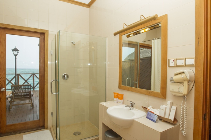 Imagen de la habitación del Hotel Fihalhohi Maldives. Foto 7