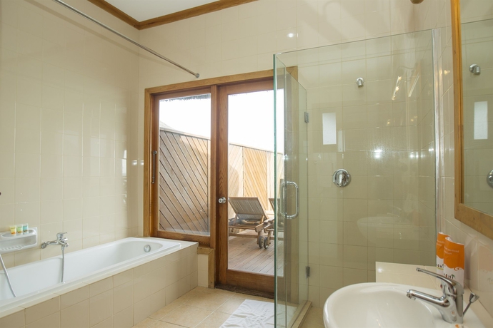 Imagen de la habitación del Hotel Fihalhohi Maldives. Foto 11