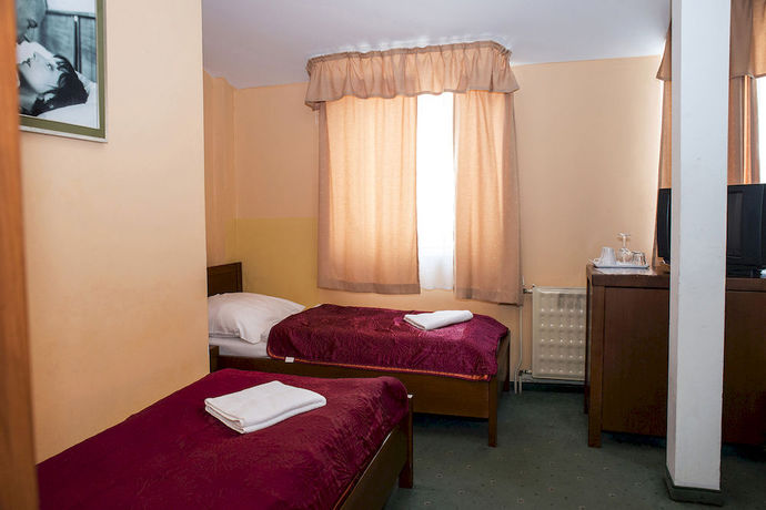 Imagen de la habitación del Hotel Film. Foto 10