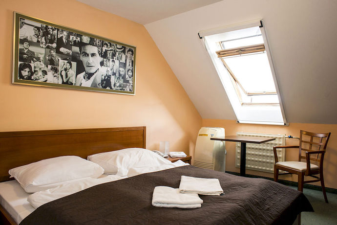 Imagen de la habitación del Hotel Film. Foto 13