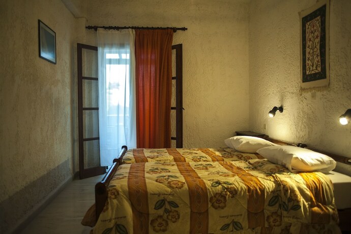 Imagen de la habitación del Hotel Filoxenia Villa. Foto 18