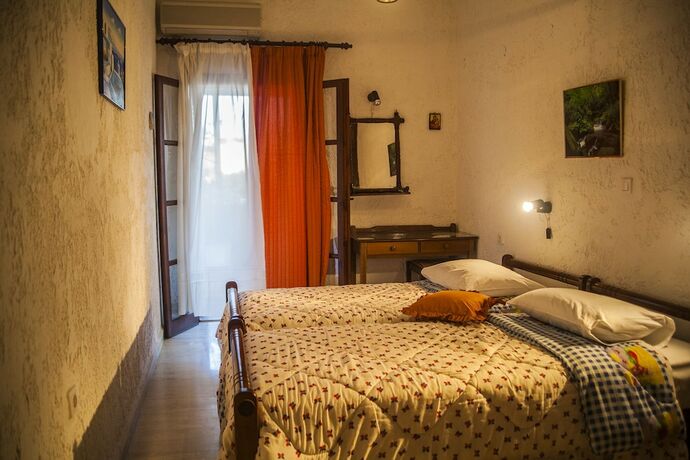 Imagen de la habitación del Hotel Filoxenia Villa. Foto 19