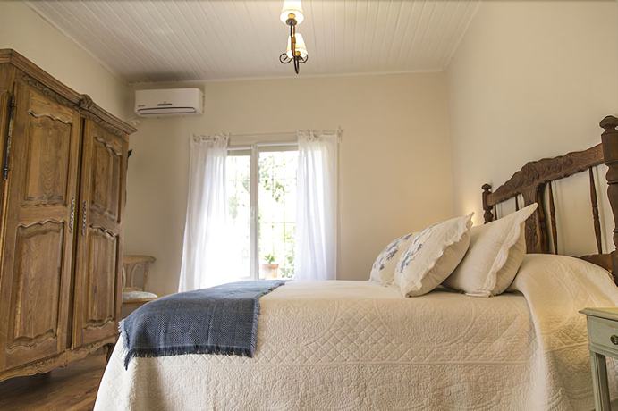 Imagen de la habitación del Hotel Finca El Maiten Posada Boutique. Foto 11