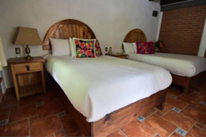 Imagen de la habitación del Hotel Finca Mexicana. Foto 14