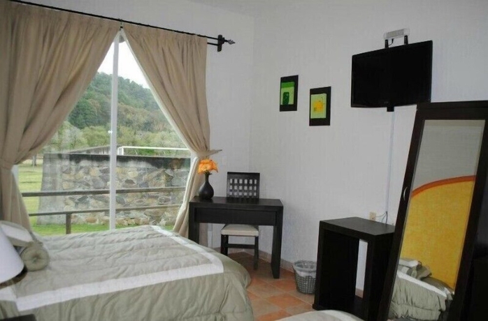 Imagen de la habitación del Hotel Finca San Fernando, Villa del Carb&oacute;n. Foto 9