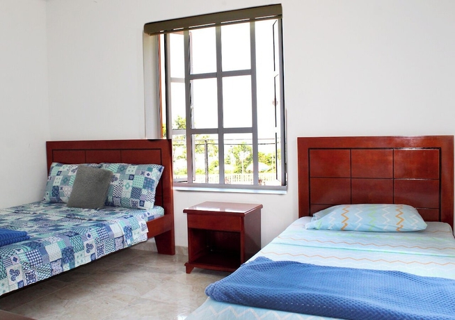 Imagen de la habitación del Hotel Finca Villa Gladys. Foto 10