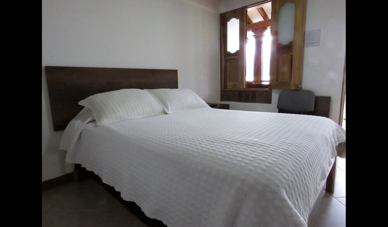 Imagen de la habitación del Hotel Finca Villa Laura. Foto 4