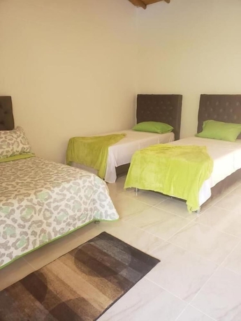 Imagen de la habitación del Hotel Finca Villa Nathaly. Foto 6
