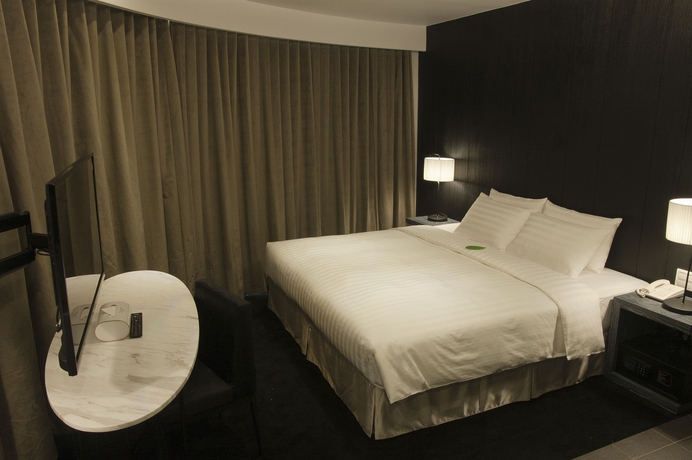 Imagen de la habitación del Hotel Finders Hotel-Fu Qian. Foto 11