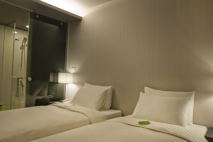 Imagen de la habitación del Hotel Finders Hotel-Fu Qian. Foto 15