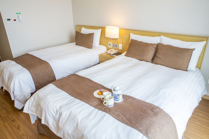 Imagen de la habitación del Hotel Fine Jeju. Foto 16
