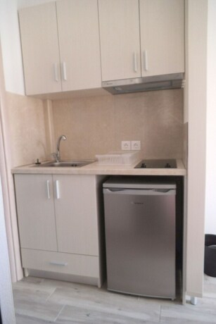 Imagen de la habitación del Hotel Finikas Garden Beach Resort Nikiti. Foto 17