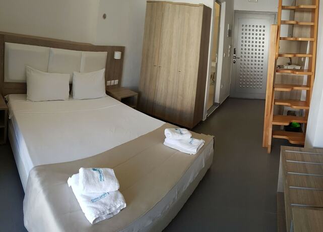 Imagen de la habitación del Hotel Finikas Garden Beach Resort Nikiti. Foto 24