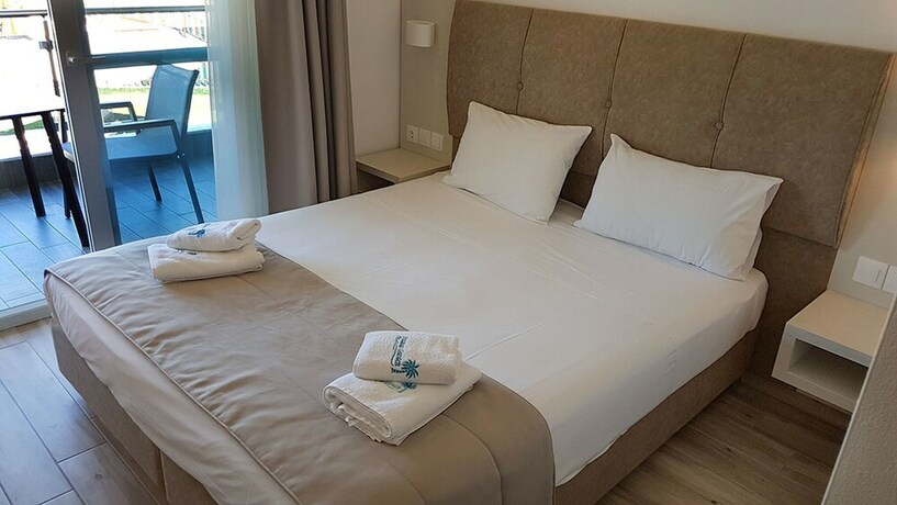 Imagen de la habitación del Hotel Finikas Garden Beach Resort Nikiti. Foto 25
