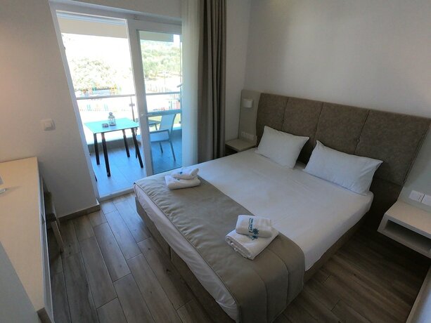 Imagen de la habitación del Hotel Finikas Garden Beach Resort Nikiti. Foto 26