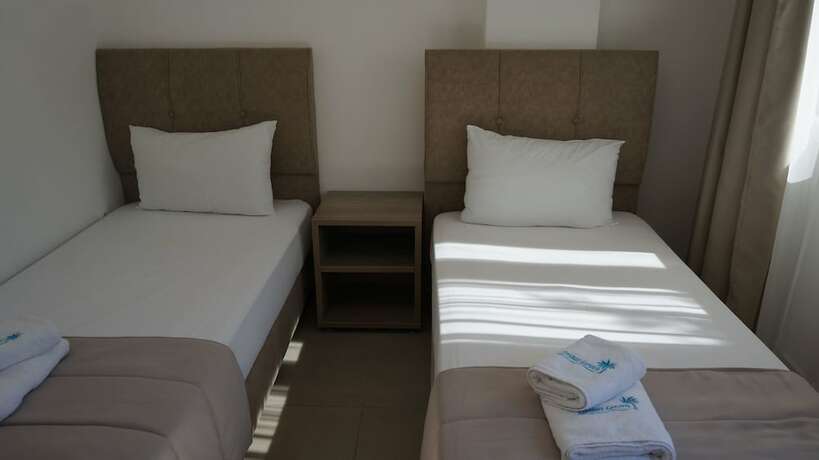 Imagen de la habitación del Hotel Finikas Garden Beach Resort Nikiti. Foto 27